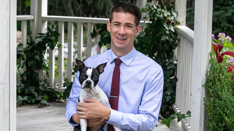 Jacob Siewert, DVM, MS, DACVIM (Oncology) and pup